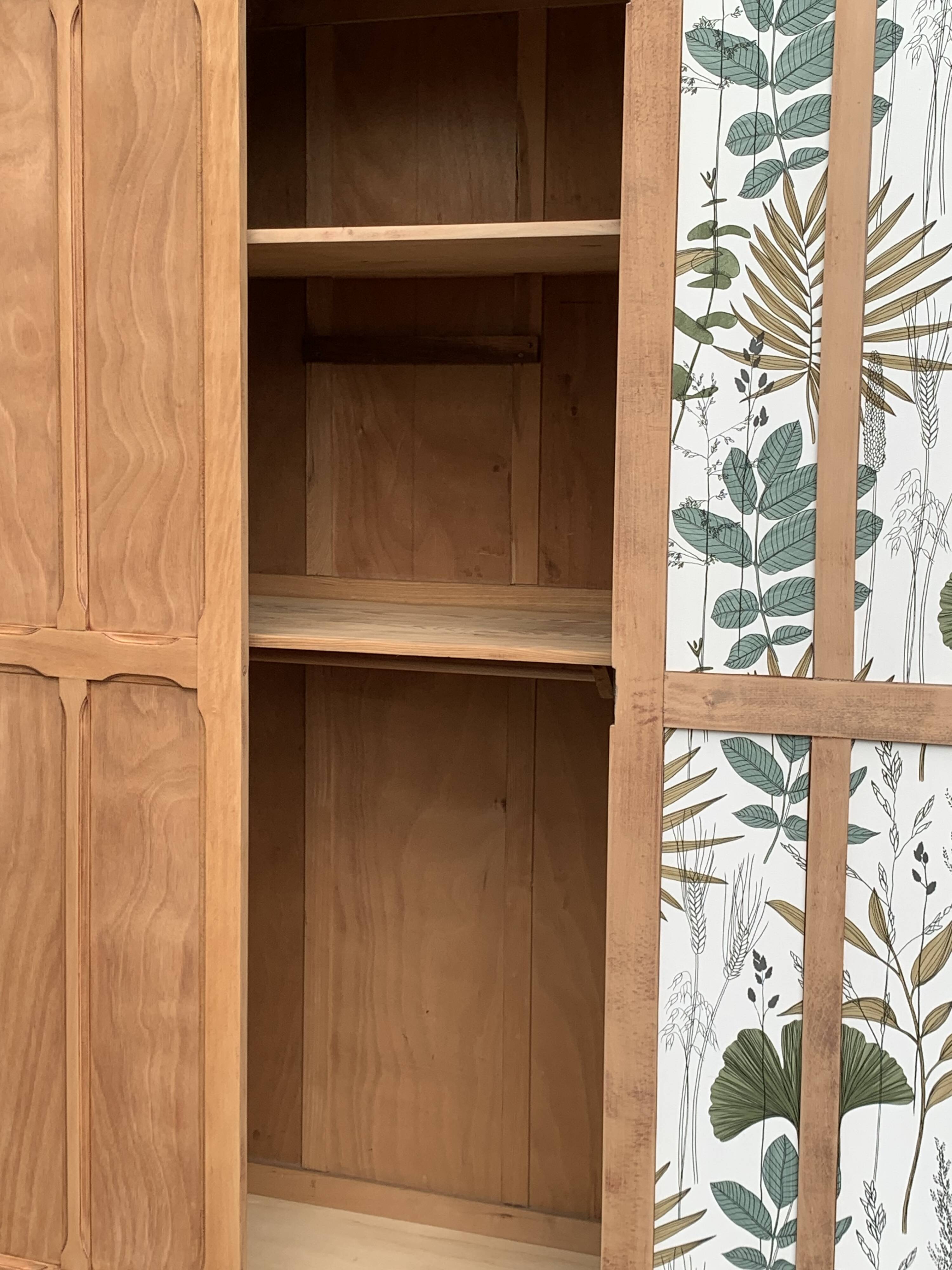 Parisian paneled cabinet in raw wood, 1940