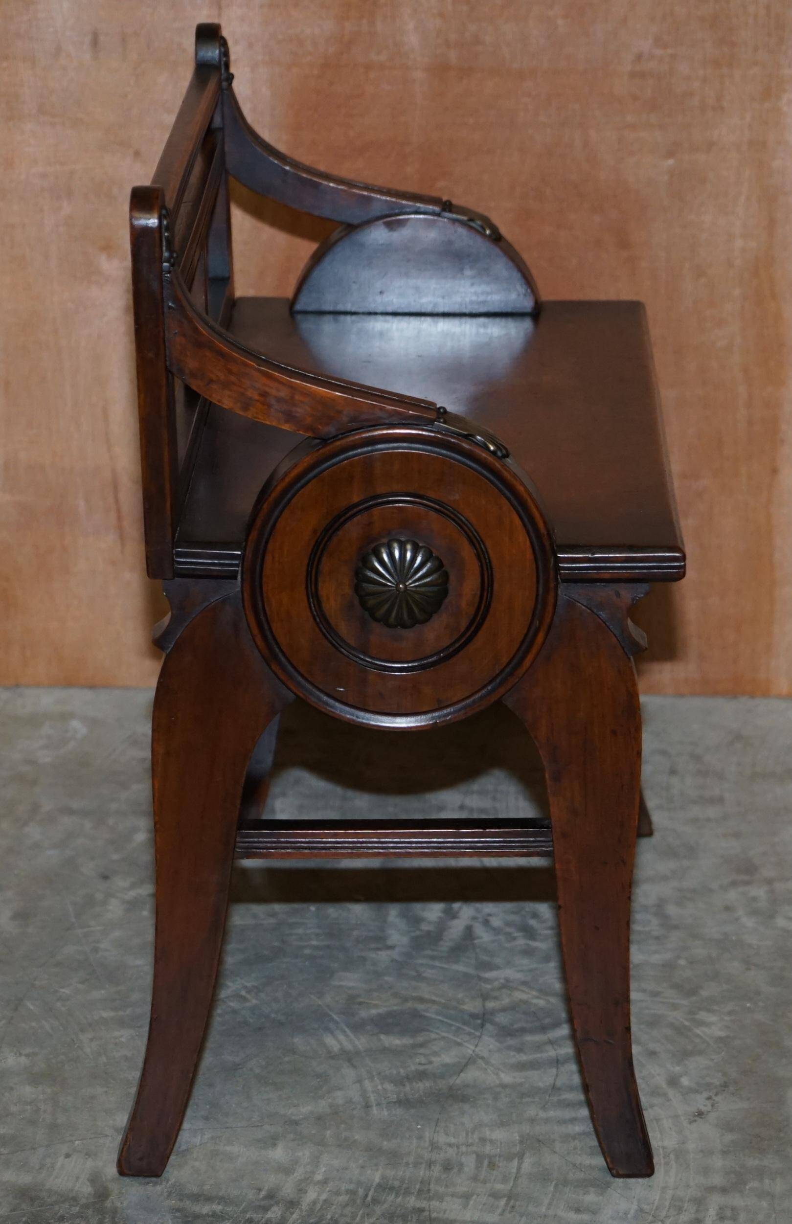 Antique entrance bench by Jas Shoolbred with brass fittings and walnut frame circa 1890.
