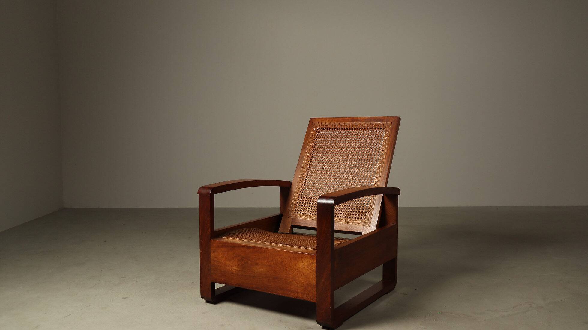 Mid-century architectural teak lounge chair with cane seat, 1950s