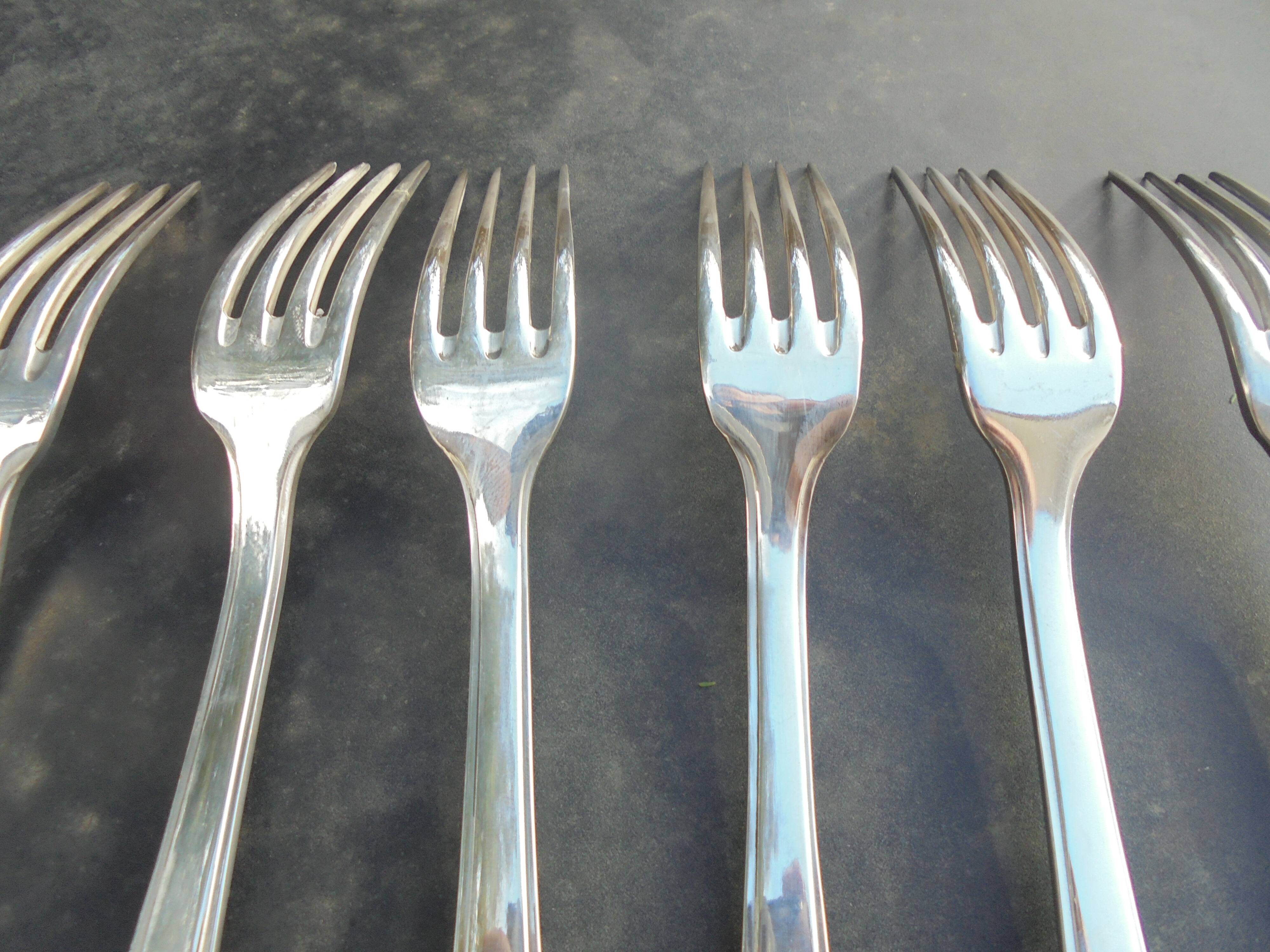 12 Art Deco silver metal forks