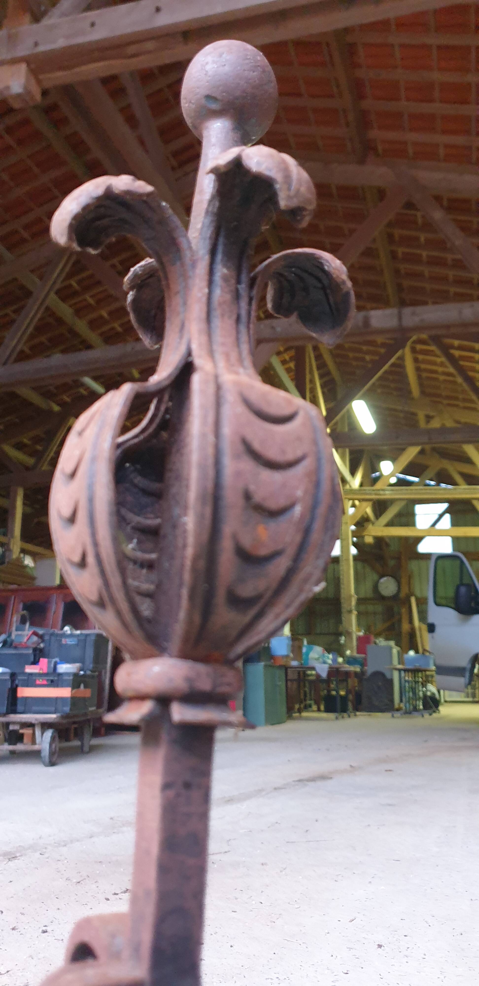 Pair of Wrought Iron Andirons with Refined Ornamentation - 20th Century