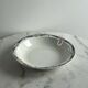 Longwy salad bowl with blue and orange floral decoration.