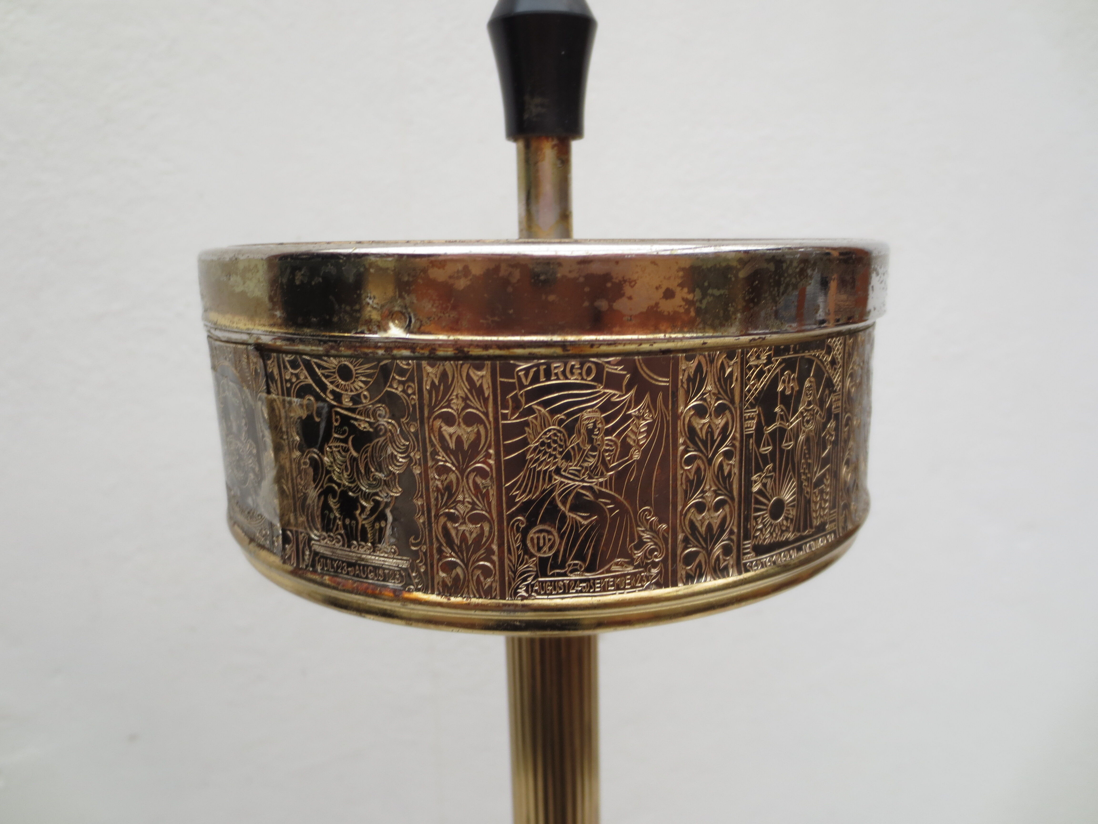 Old ashtray on foot year 50 in gilded brass
