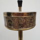 Old ashtray on foot year 50 in gilded brass