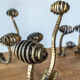 Set of six hammered Art Deco coat hooks