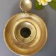 brass candle holder with old cellar rat thumb