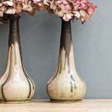 Pair of glazed sizzlings, signed