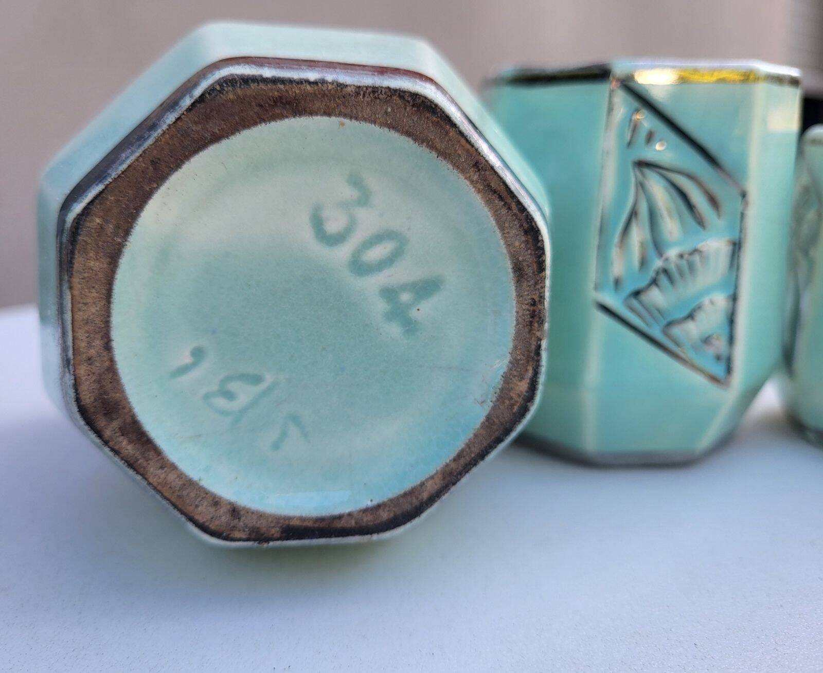 Set of 4 Art Deco celadon green and silver barbotine pots.