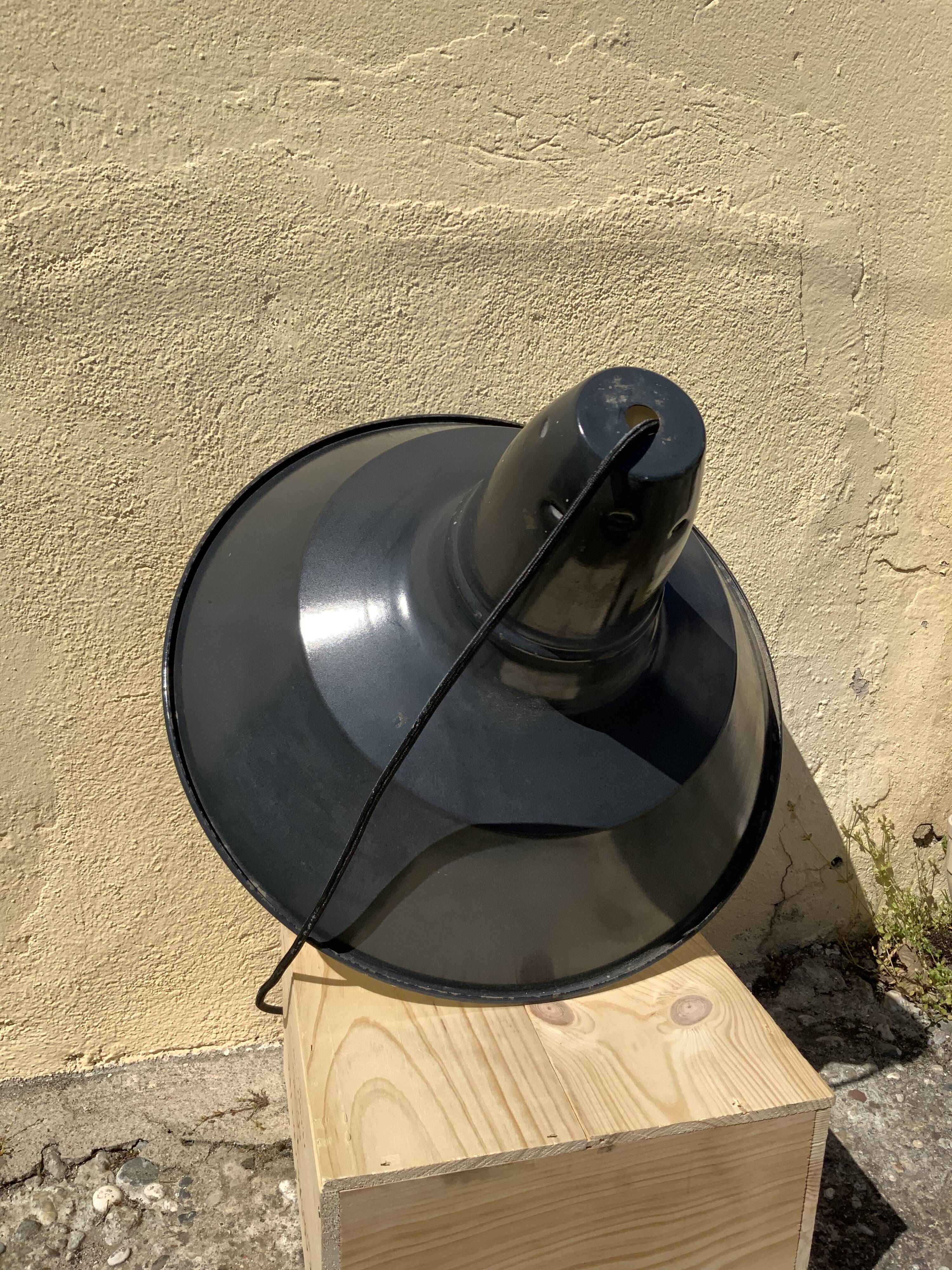 Three industrial suspensions in black and white enamelled sheet metal large format