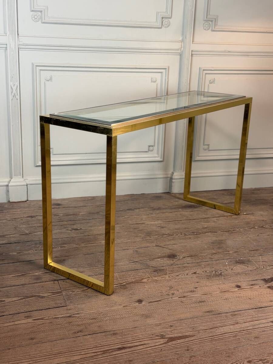 Golden and chrome metal console, bevelled glass, circa 1980.