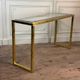 Golden and chrome metal console, bevelled glass, circa 1980.