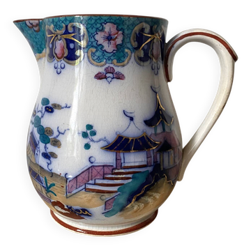 Antique Sarreguemines pitcher with polychrome Assie decoration.
