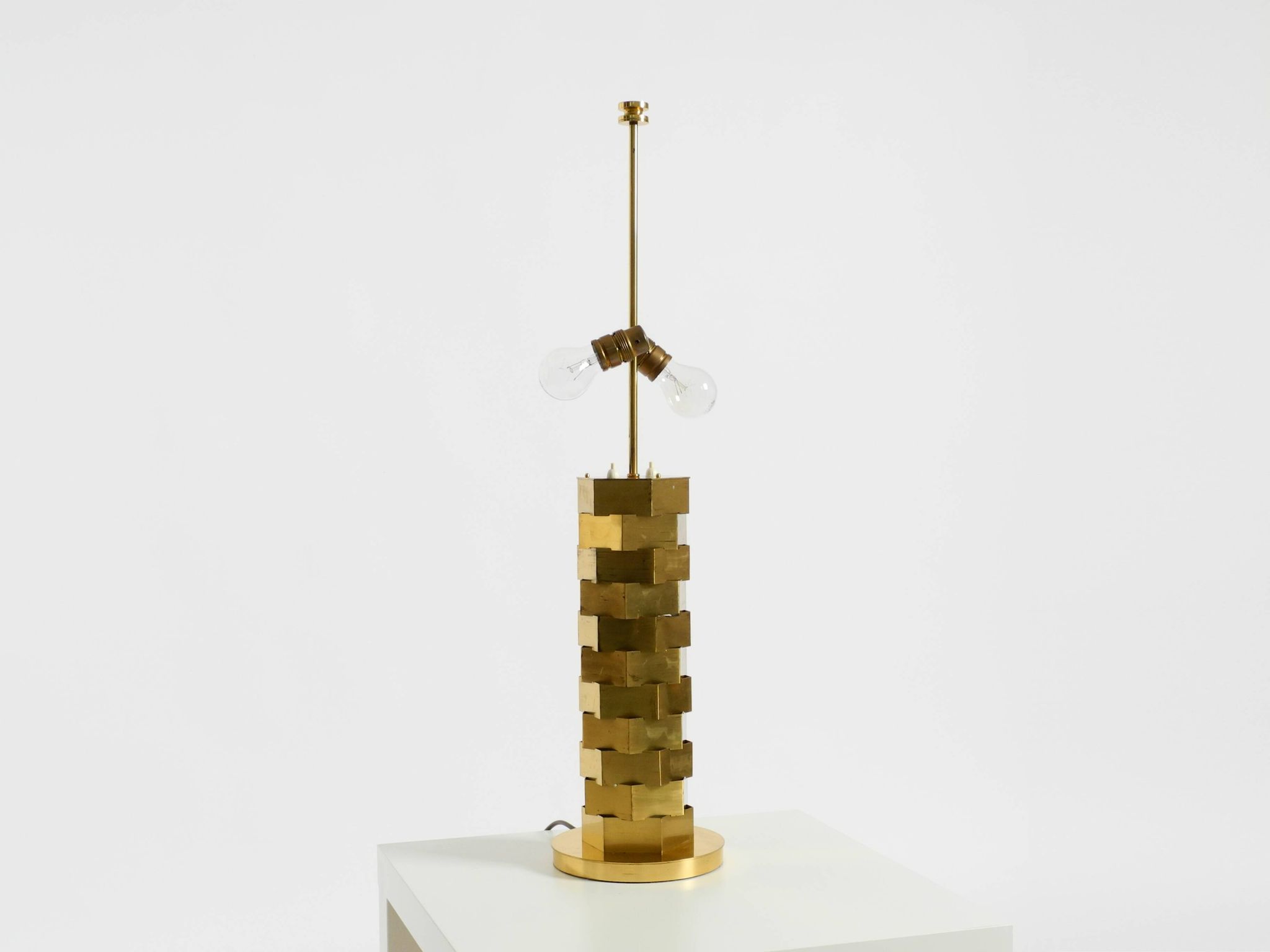 1960s brass table lamp by Vereinigte Werkstätten with an illuminated base