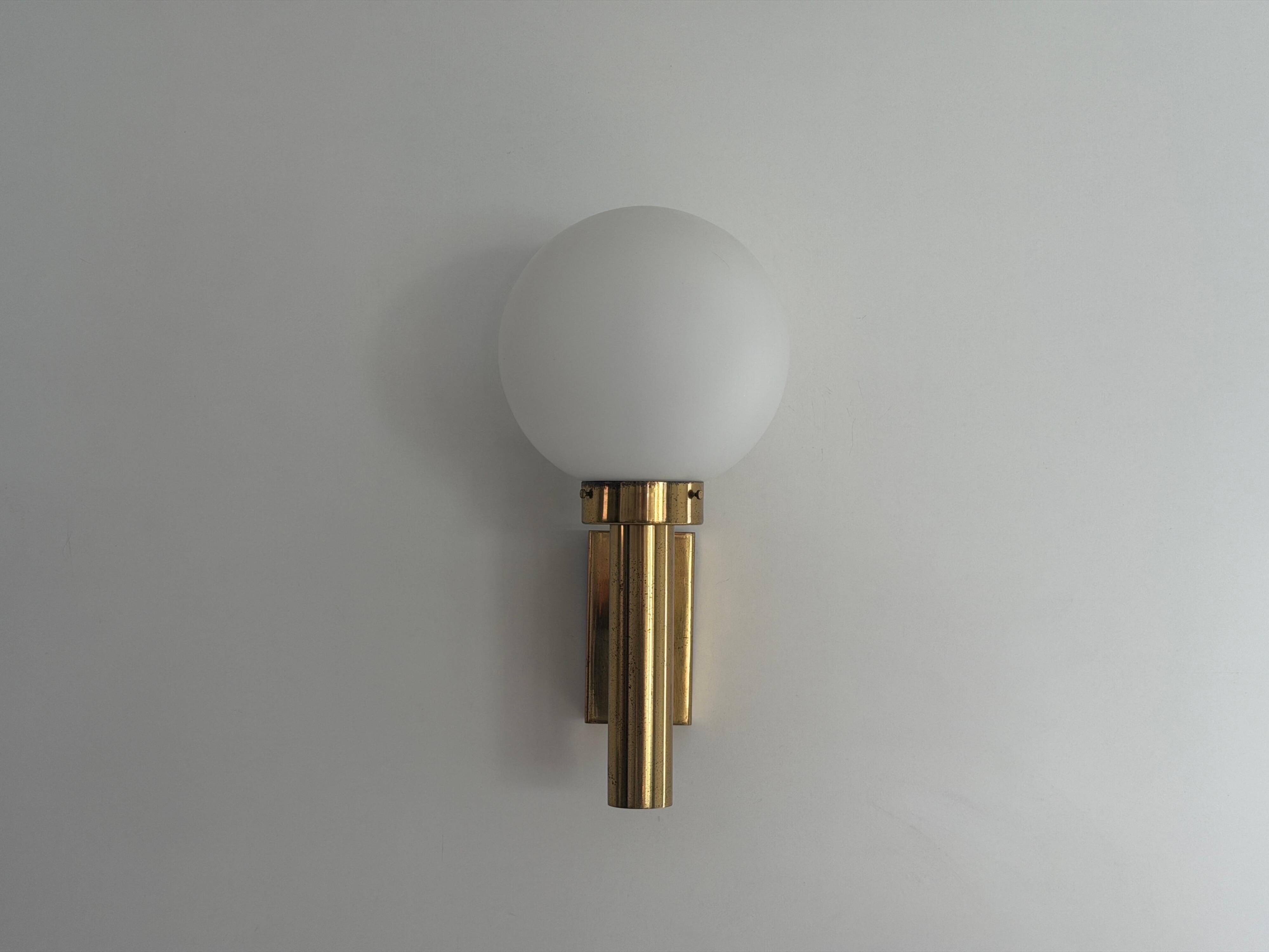 Large minimalist cinema wall light in opal glass and heavy brass, 1960s, Germany