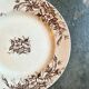 Round plate in iron earth HB & Cie