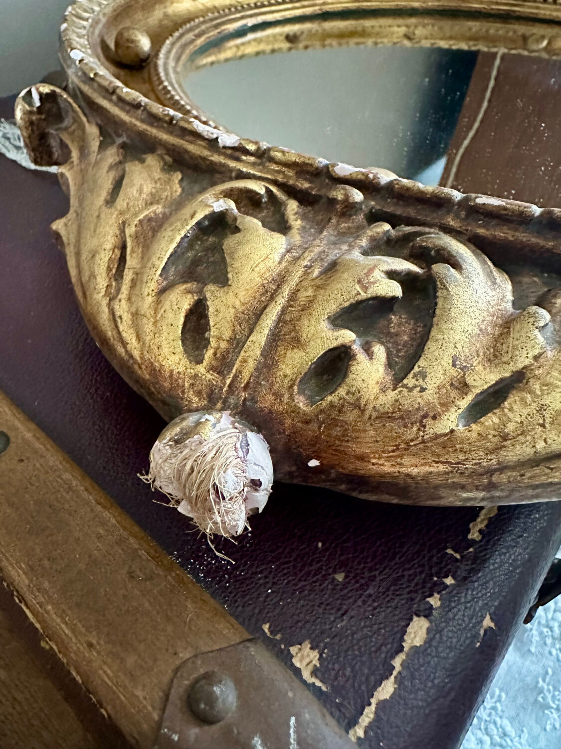 Antique gilded mirror decorated with an eagle