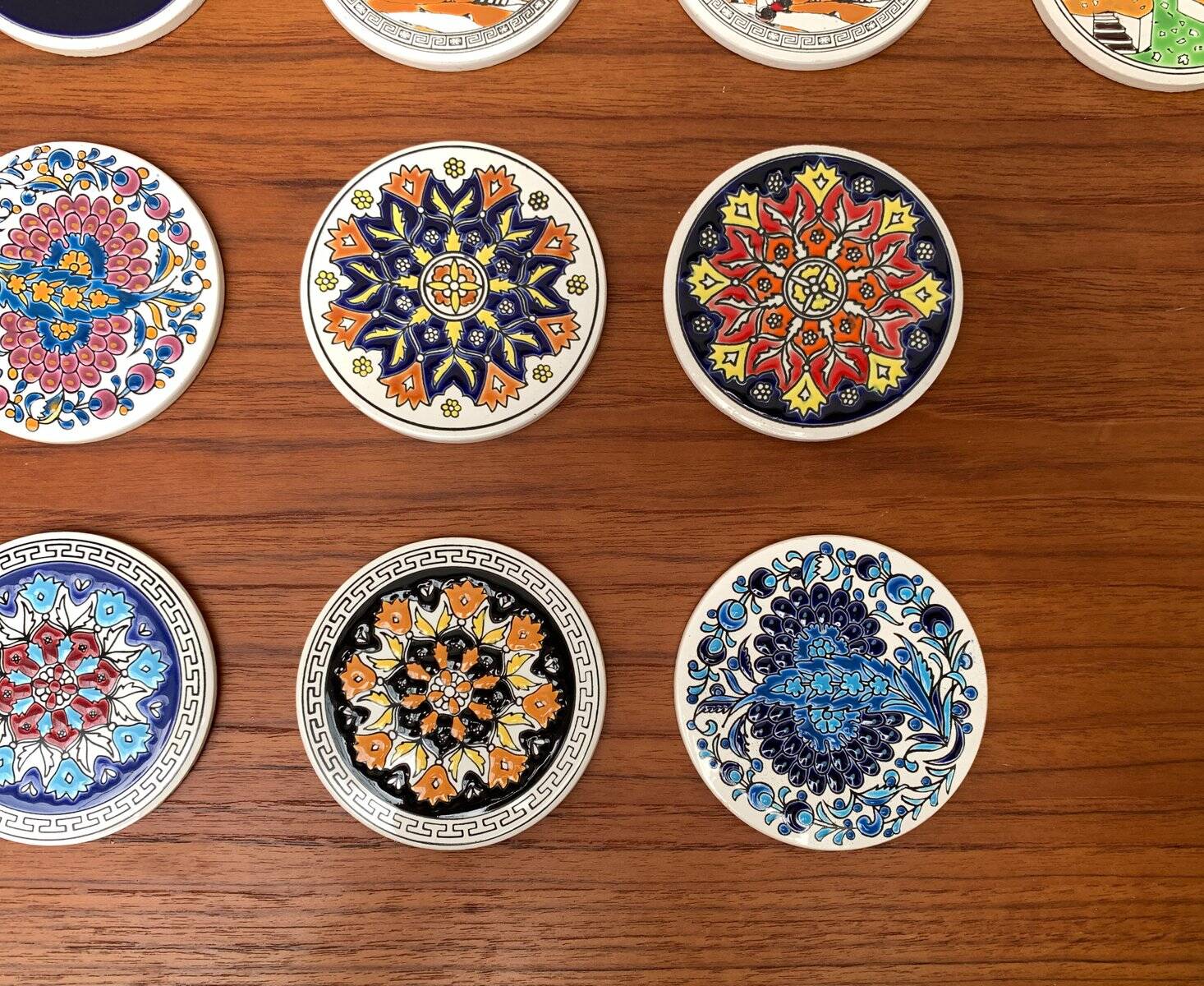 Set of 13 vintage ceramic coasters handmade by Lito Niarchos.