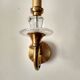Pair of old brass wall sconces