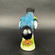 Figurine porcelaine oiseau polychrome sur socle fleuri vintage