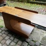 Rolling teak coffee table with foldable top circa 1960