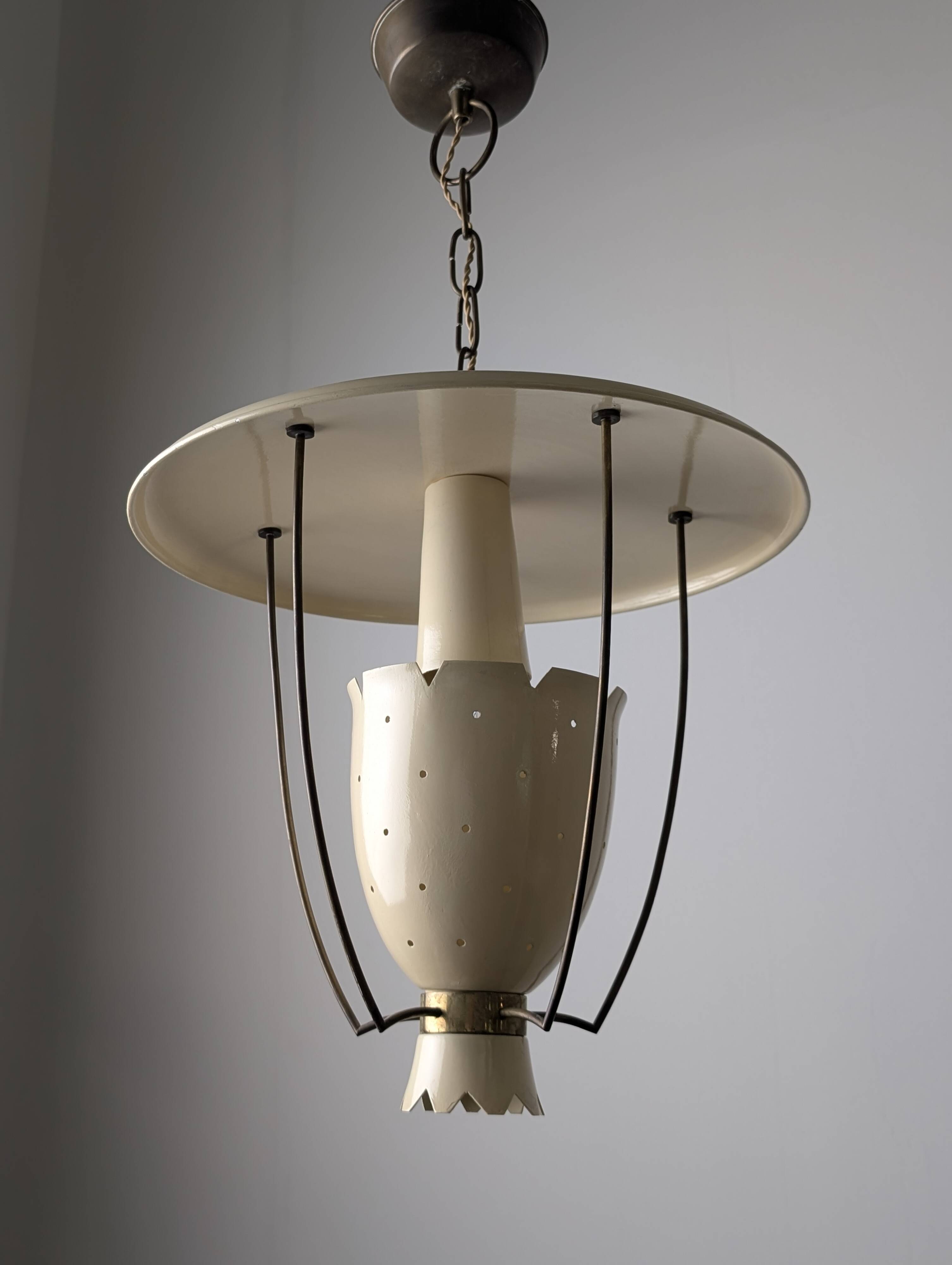 Perforated metal pendant lamp with brass details, Italy, 1940s