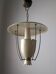 Perforated metal pendant lamp with brass details, Italy, 1940s