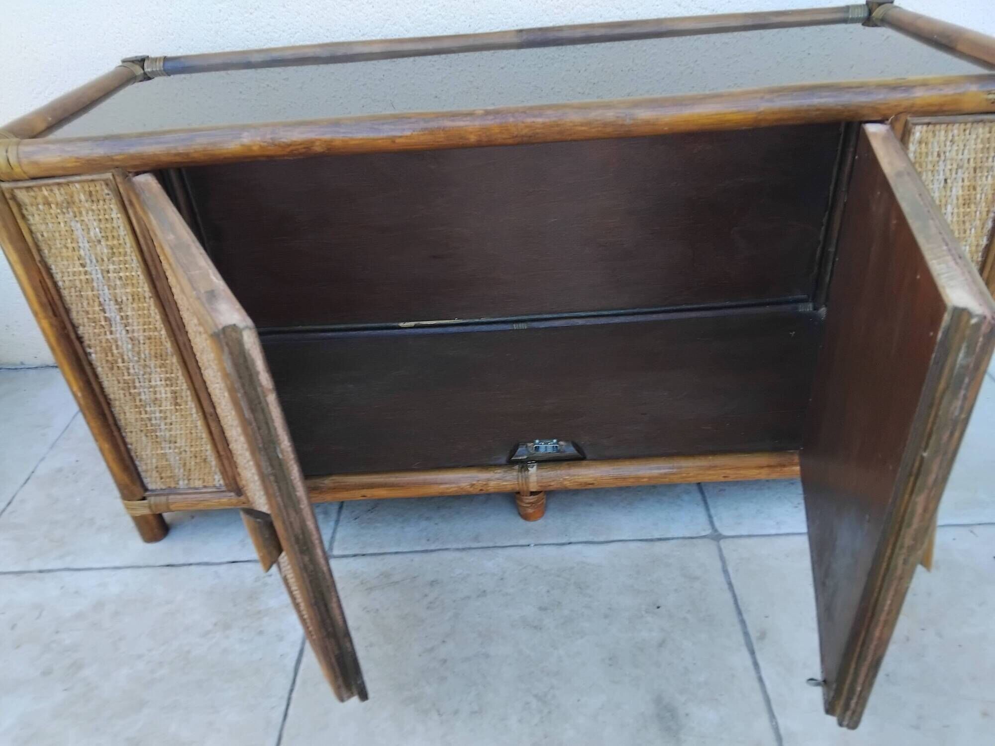 Vintage sideboard TV unit in rattan, bamboo and glass.