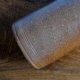 Enamelled brown sandstone bottle with handle