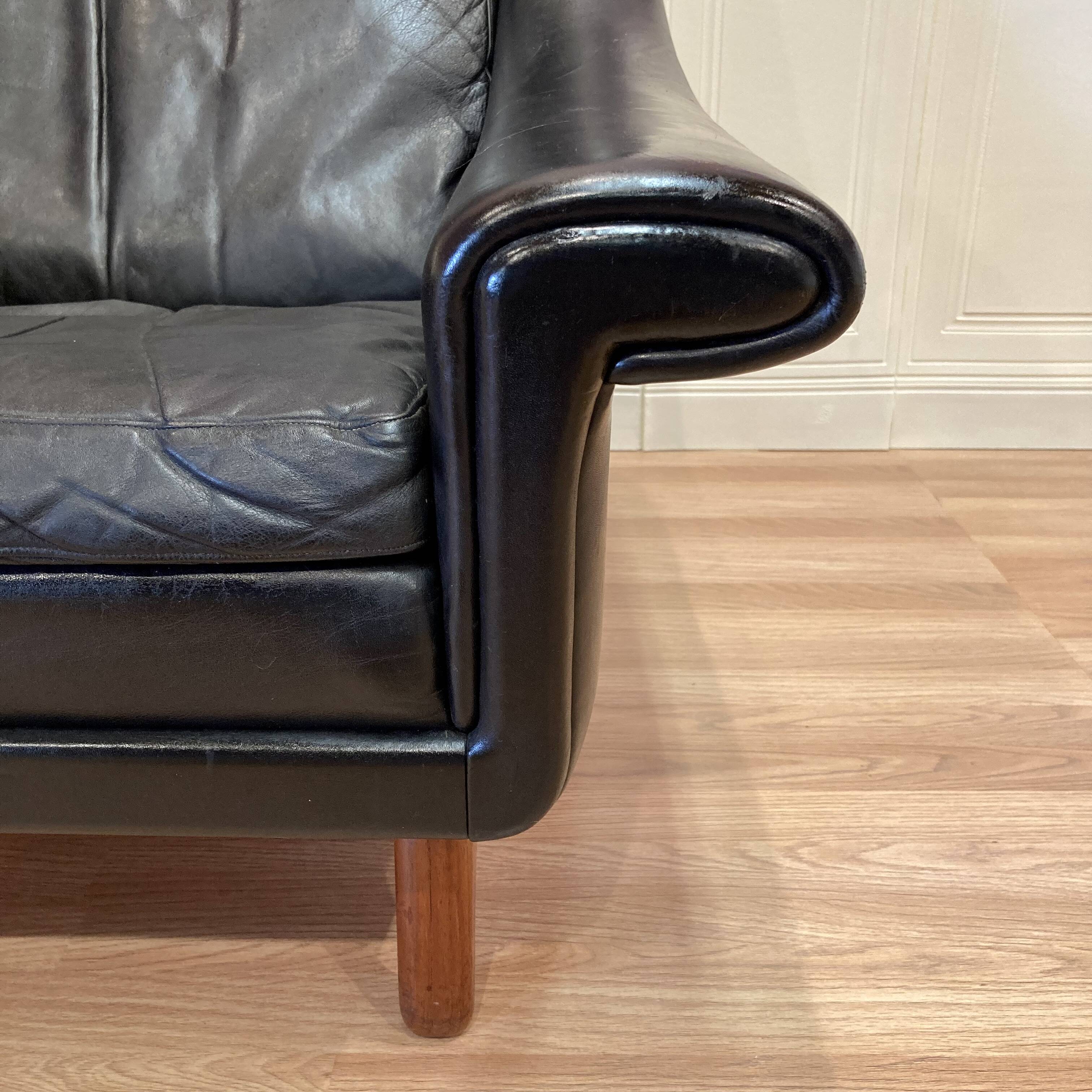Scandinavian design armchair Aage Christiansen black leather 1950.