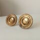 Pair of antique Empire furniture knobs in gilded solid bronze.
