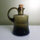 Thick handmade blown glass pitcher