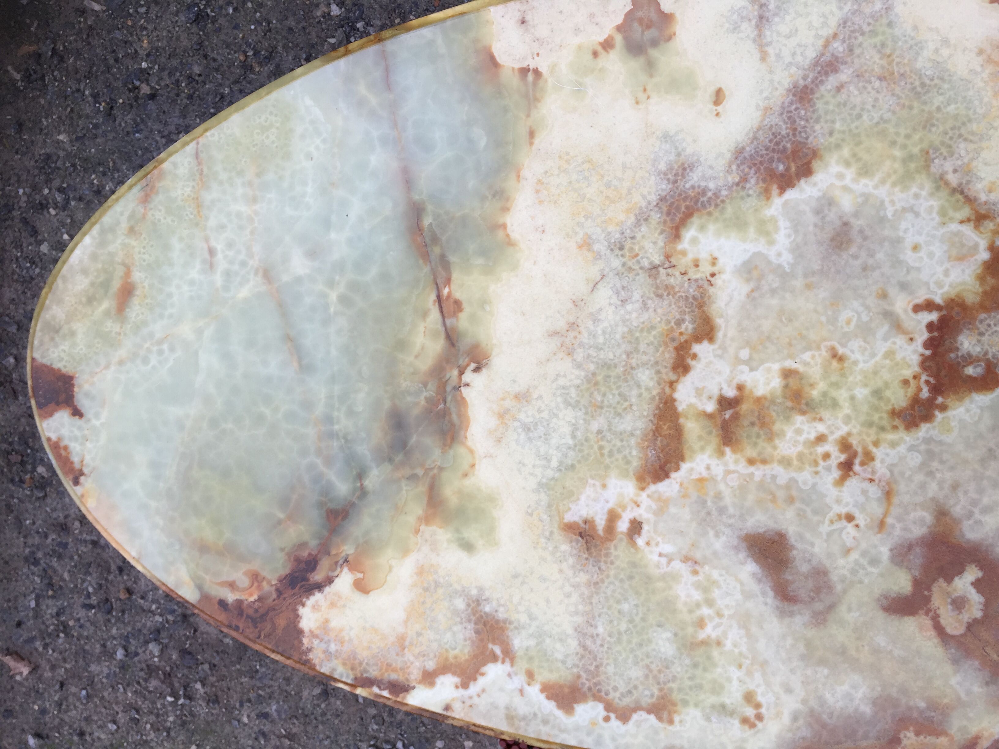 Vintage brass coffee table and oval alabaster top.