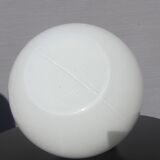 Trio of opal glass and bakelite globe pendant lights