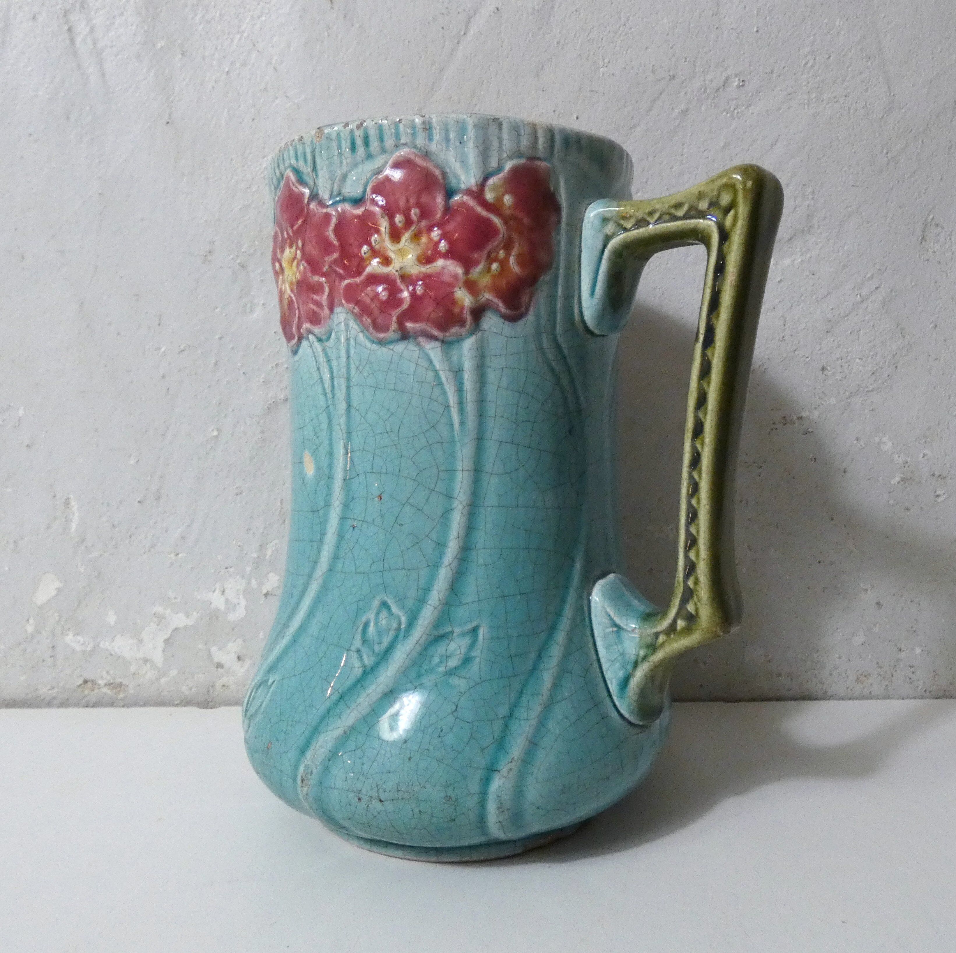 Antique Art Deco turquoise flowered slipware jug vase
