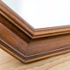 Miroir vintage octogonal en bois massif avec détails sculptés