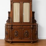 Important two-body buffet from a hunting lodge in carved walnut, Renaissance style.
