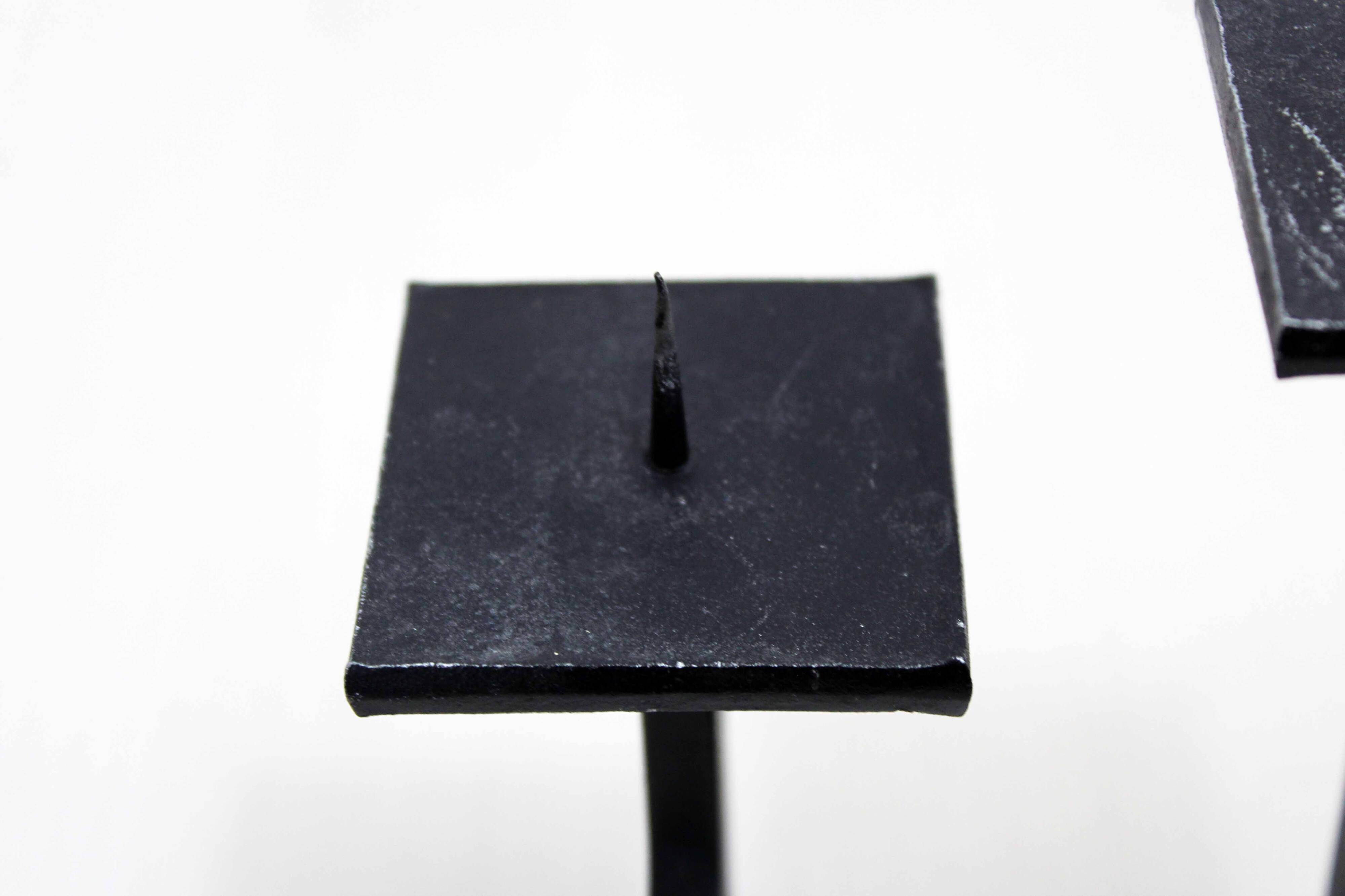 Modernist cast iron candle holder