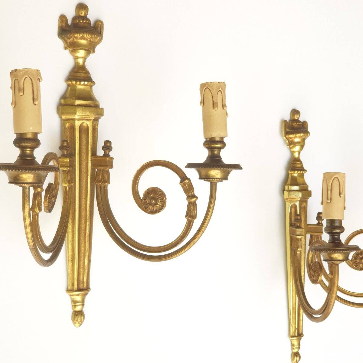 Pair of bronze wall sconces in Louis XVI style