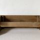 Low stool in raw wood