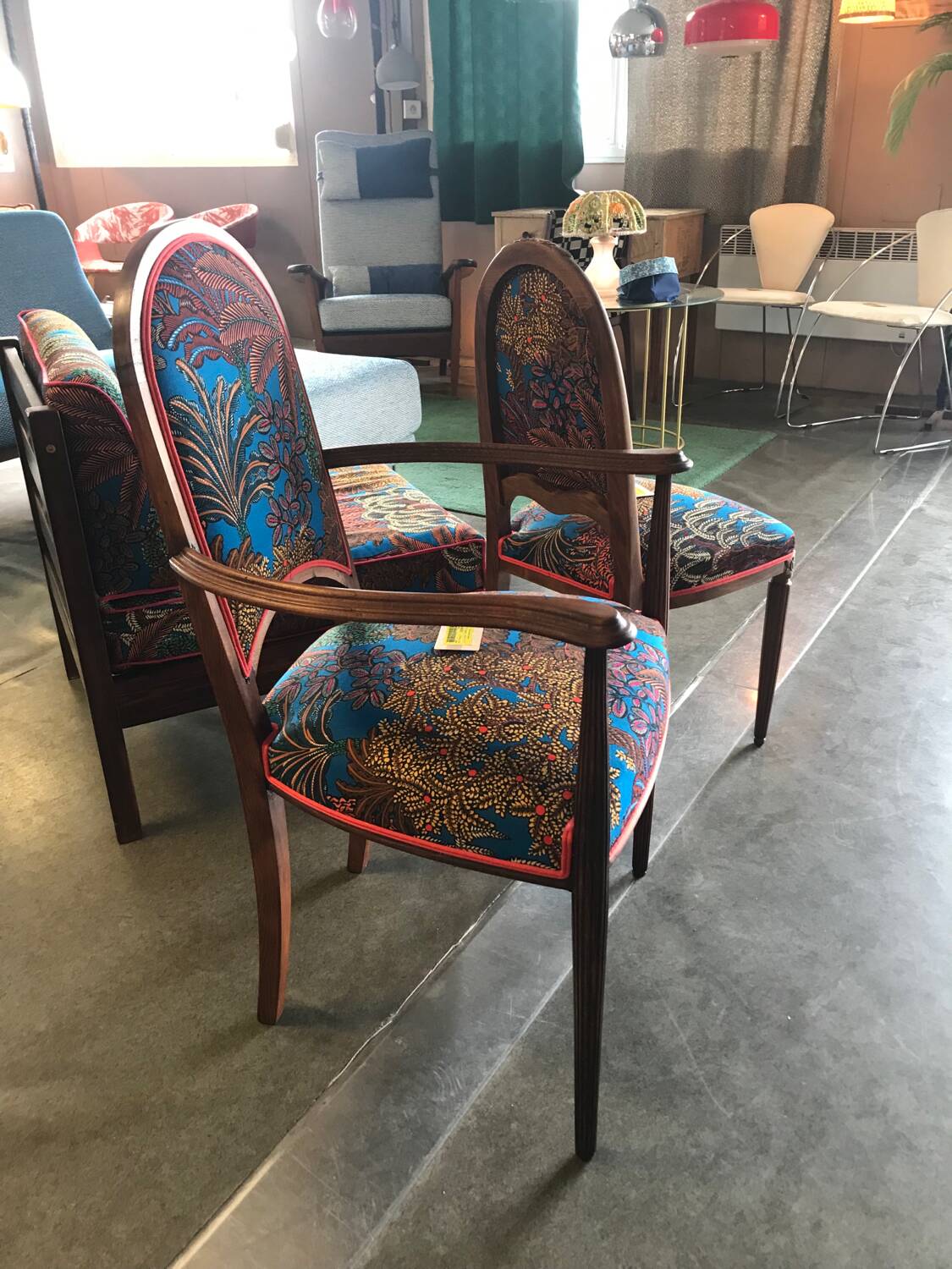 Art Nouveau chair with floral fabric and carved wood
