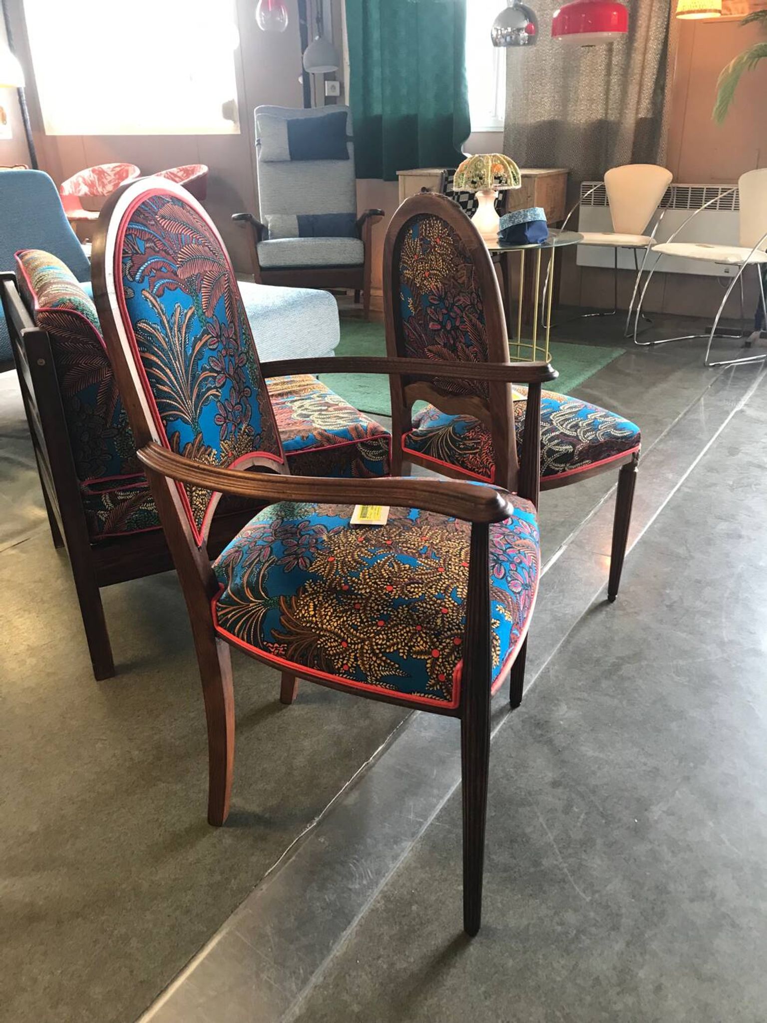 Art Nouveau chair with floral fabric and carved wood