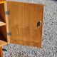 Vintage golden oak sideboard with conical legs from the 1950s
