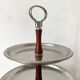 Vintage tiered display stand, stainless steel rotating server Alessi Fratelli
