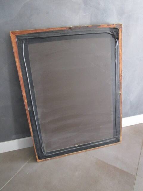 Antique mirror in wood and gilded stucco