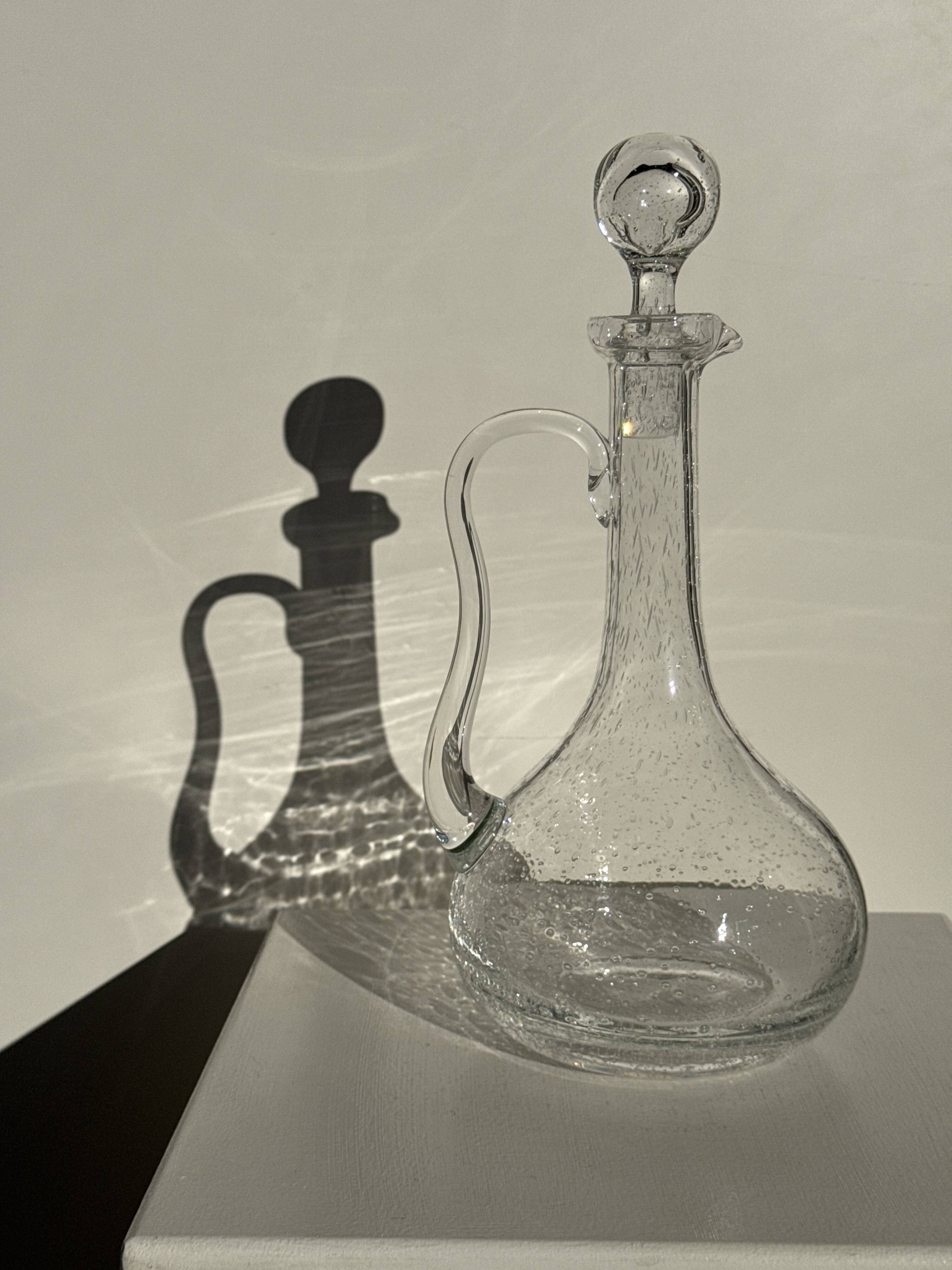 Large transparent glass carafe with a Biot stopper H32 D14.5