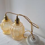 Duo of amber molded glass pendant lights
