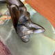 Art Deco female sculpture in bronze with onyx base.