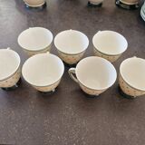 Set of polka dot porcelain cups and plates