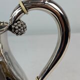 Water jug on feet decorated with ebony of hallmarked silver from the 1940s. The jug is in great anti