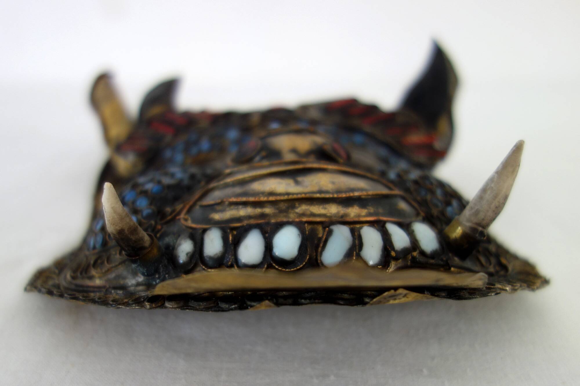 Vintage ritual mask in repoussé brass from Nepal/Tibet.